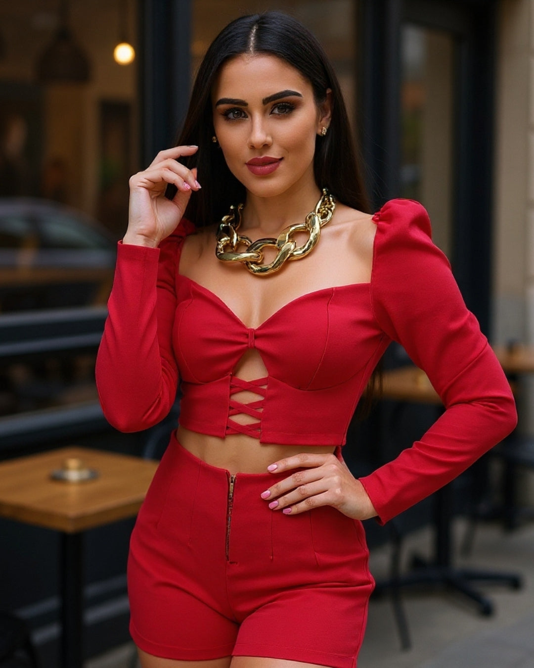 Vela — set con top abullonado y shorts de cintura alta