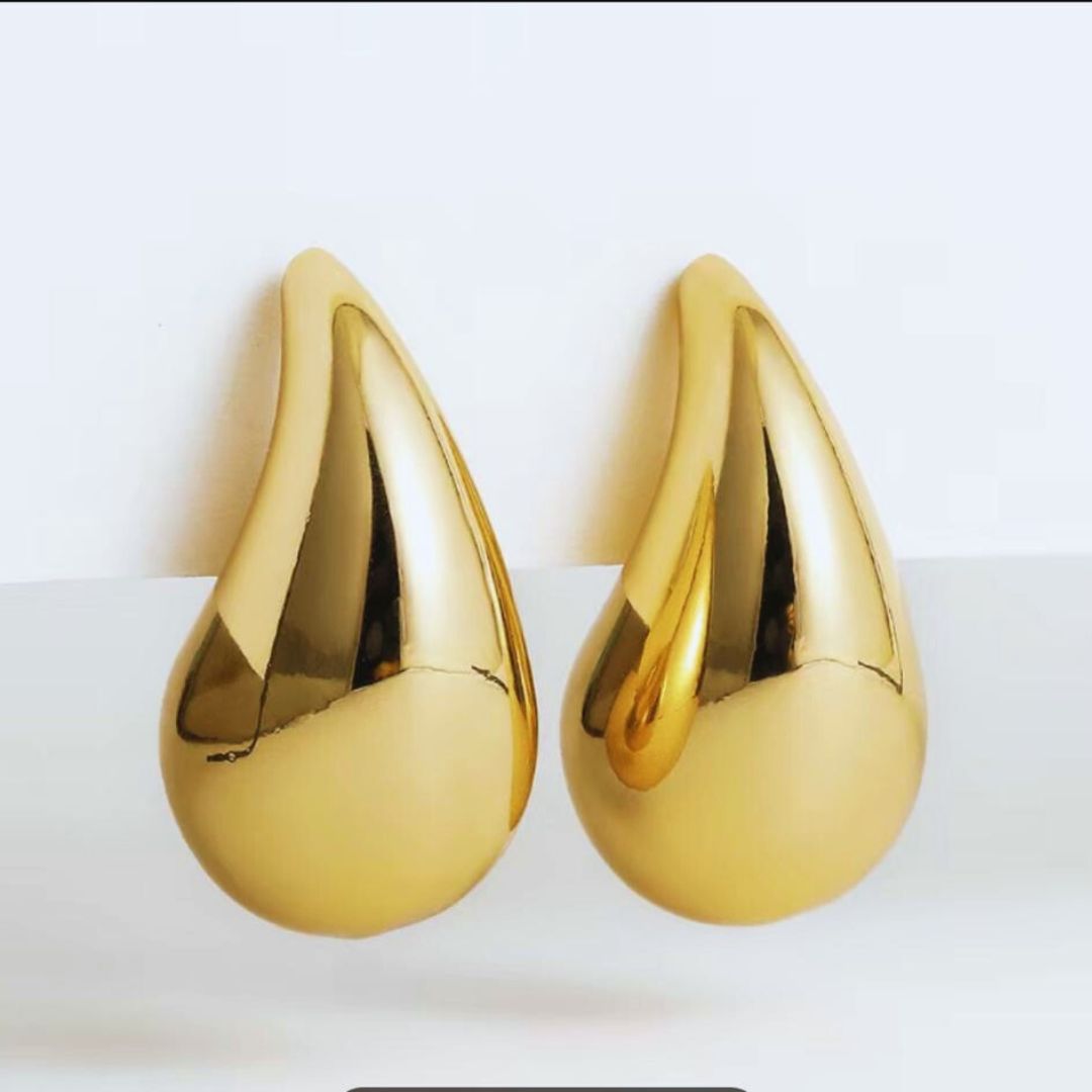 aretes dorados
aretes minimalistas
joyería elegante
accesorios modernos
aretes importados
joyería dorada
aretes tipo broquel
accesorios GV
aretes sofisticados
GV Boutique