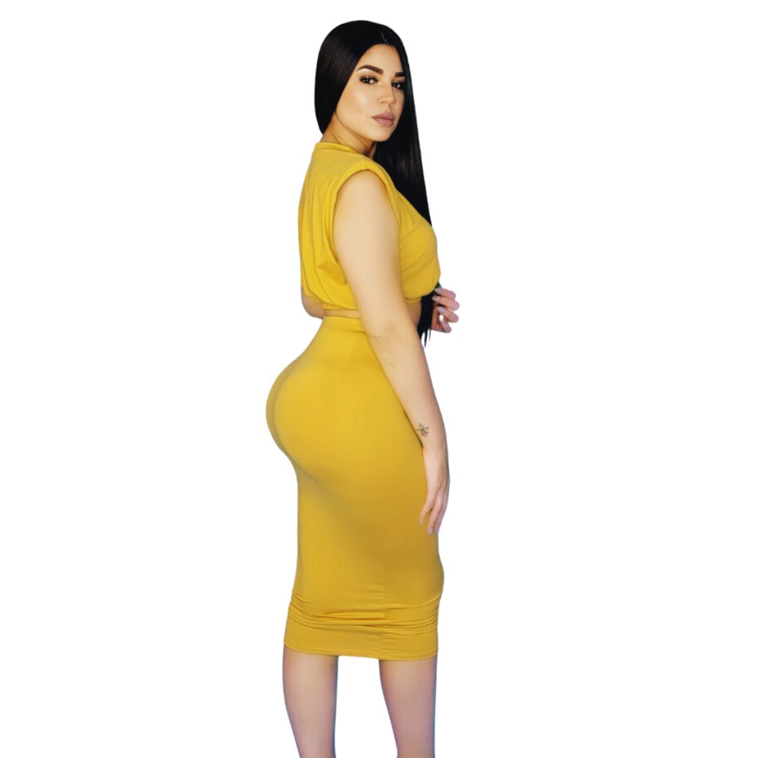 Set crop top falda midi
Ropa chic mujer
Outfit casual elegante
Moda caribeña
Conjunto amarillo
Conjunto verde lima
Ropa de verano
Estilo moderno mujer
Outfit versátil
Ropa femenina importada