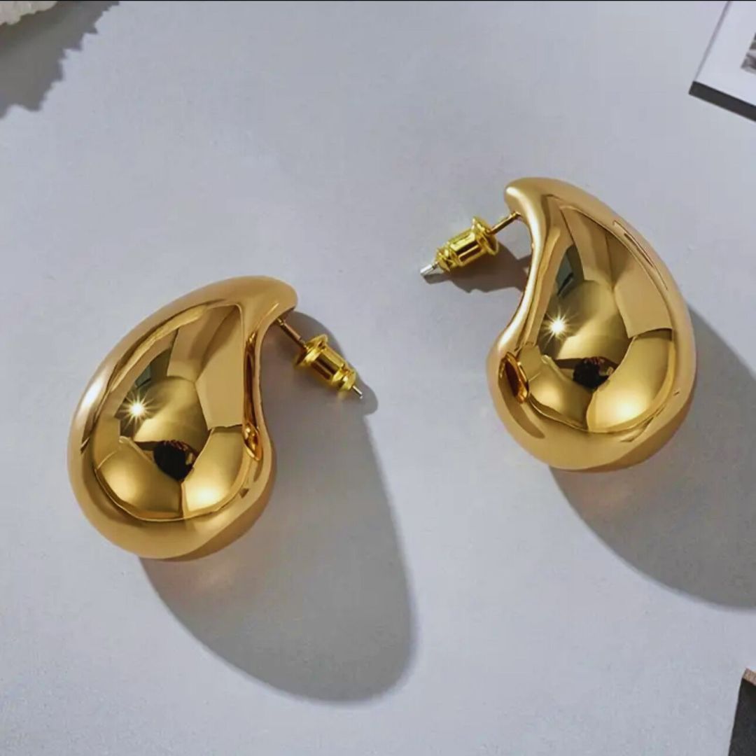 aretes dorados
aretes minimalistas
joyería elegante
accesorios modernos
aretes importados
joyería dorada
aretes tipo broquel
accesorios GV
aretes sofisticados
GV Boutique