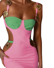 vestido mini
vestido rosa y verde
vestido con corazones dorados
ropa de fiesta
vestido ajustado
moda femenina elegante
outfit nocturno
ropa de tendencia
GV Boutique
vestido con cortes laterales