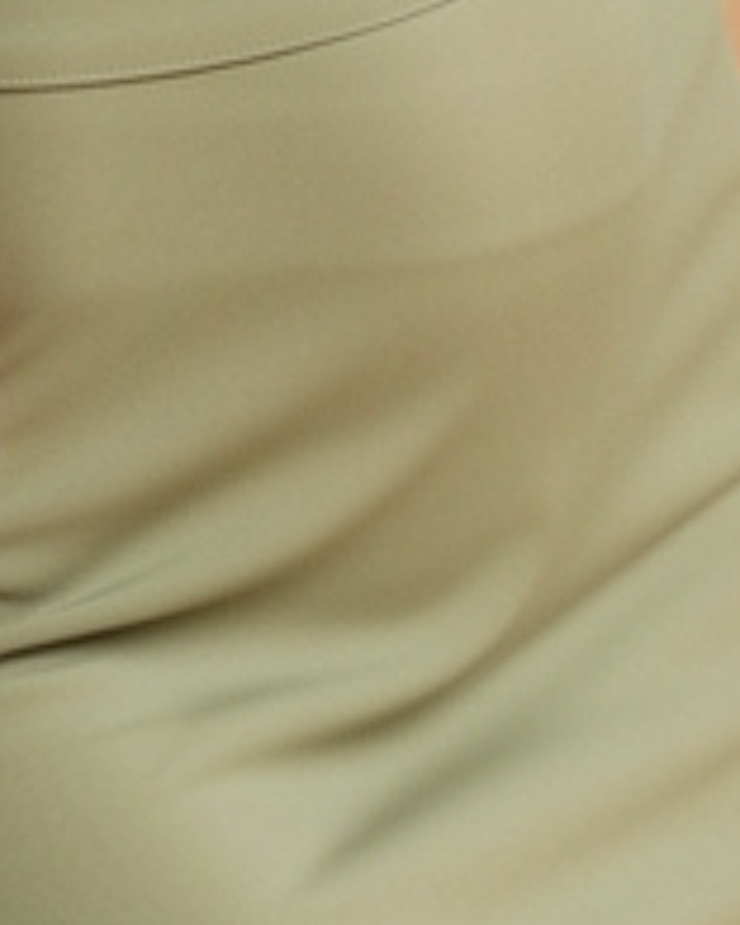 Sienna — set bandage verde sage con crop top cruzado