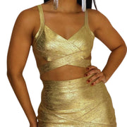 conjunto dorado
set dos piezas
falda mini dorada
crop top cruzado
ropa de fiesta
outfit glam
moda elegante
ropa para eventos
GV Boutique
look de impacto