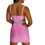 vestido mini
vestido rosa y verde
vestido con corazones dorados
ropa de fiesta
vestido ajustado
moda femenina elegante
outfit nocturno
ropa de tendencia
GV Boutique
vestido con cortes laterales