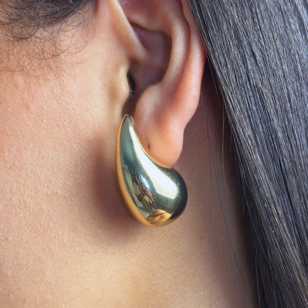 aretes dorados
aretes minimalistas
joyería elegante
accesorios modernos
aretes importados
joyería dorada
aretes tipo broquel
accesorios GV
aretes sofisticados
GV Boutique