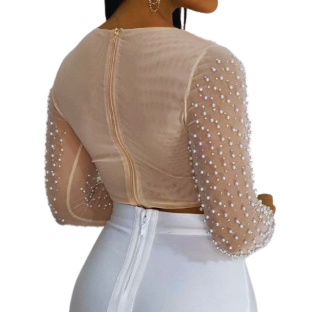 crop top nude
blusa elegante perlas
top de malla
ropa para eventos
moda sofisticada
blusa con mangas largas
outfit de noche
ropa femenina chic
GV Boutique top
blusa moderna elegante