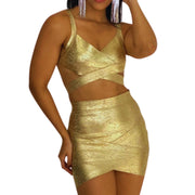 conjunto dorado
set dos piezas
falda mini dorada
crop top cruzado
ropa de fiesta
outfit glam
moda elegante
ropa para eventos
GV Boutique
look de impacto