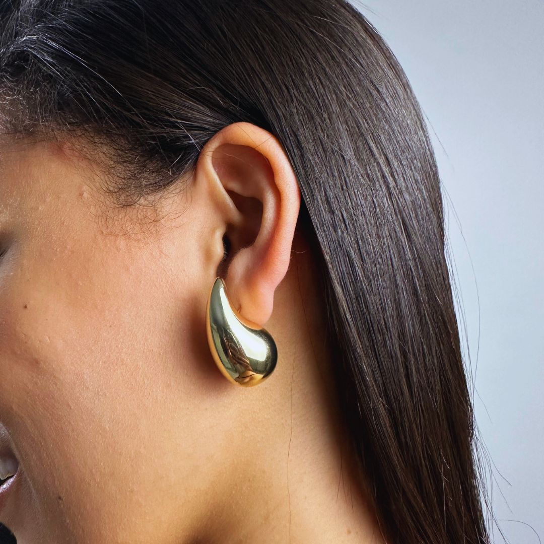 aretes dorados
aretes minimalistas
joyería elegante
accesorios modernos
aretes importados
joyería dorada
aretes tipo broquel
accesorios GV
aretes sofisticados
GV Boutique