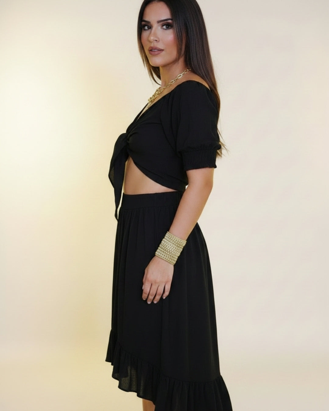 Solène — conjunto de dos piezas con top de lazo y falda midi con volantes