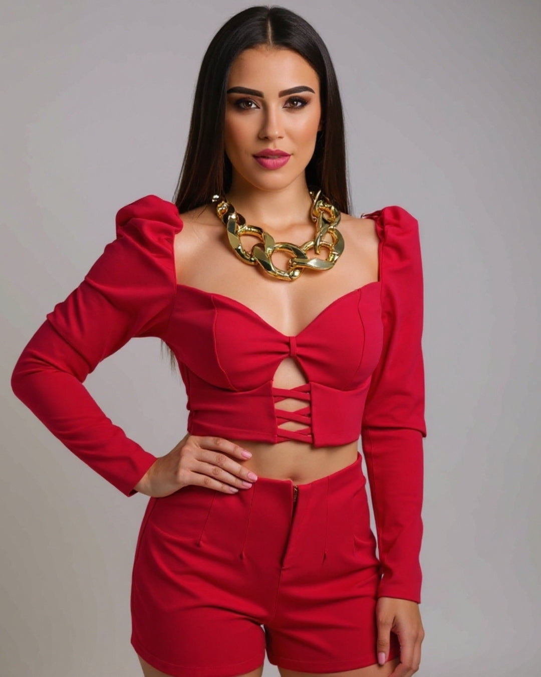 Vela — set con top abullonado y shorts de cintura alta