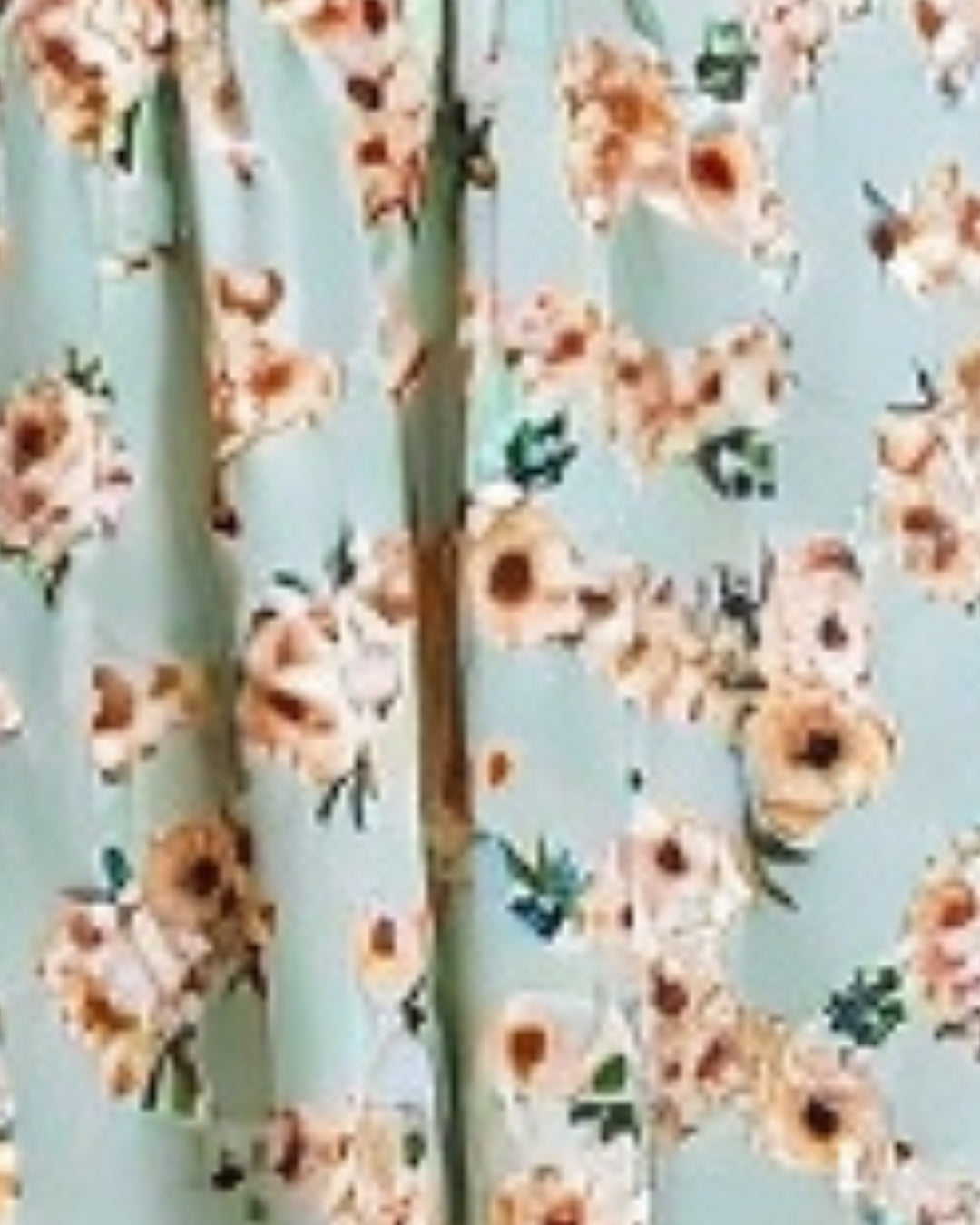 Avelin — romper floral con cinturón ajustable y escote en V