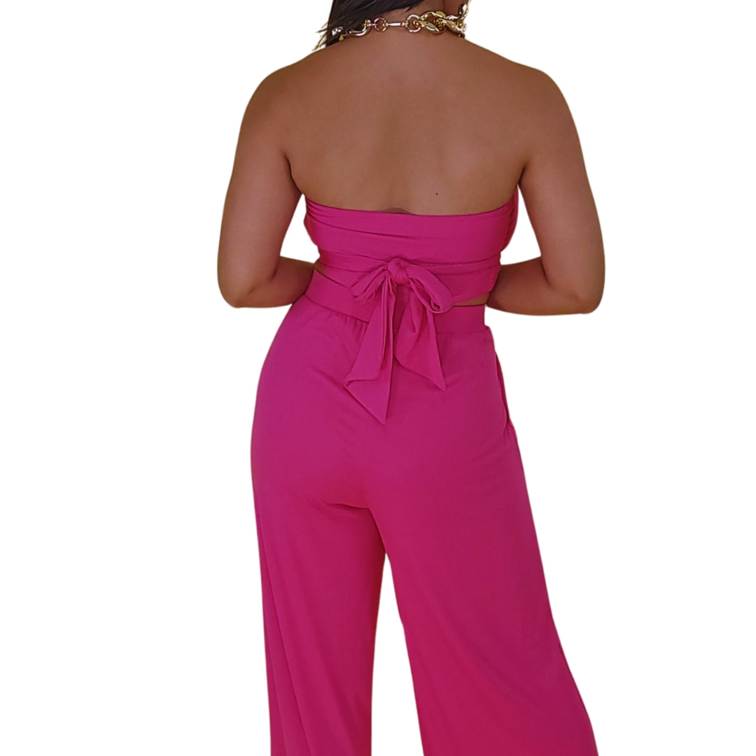 Conjunto palazzo
Crop top halter
Conjunto fucsia mujer
Outfit elegante y cómodo
Pantalón tiro alto
Top ajustable
Ropa para eventos
Look versátil
Estilo femenino
GV Boutique