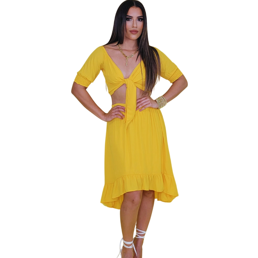 conjunto dos piezas
crop top con lazo
falda midi volantes
outfit bohemio chic
moda casual femenina
conjunto elegante mujer
ropa veraniega mujer
conjunto falda y top
conjunto frescura caribeña
estilo chic moderno