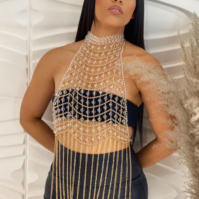 top halter transparente
top con pedrería
top con flecos dorados
ropa de fiesta elegante
outfit glamuroso
GV Boutique
top nocturno
moda femenina sofisticada
statement piece
ropa para destacar